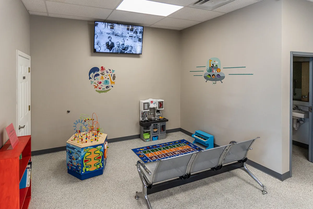 A children's play area in a laundromat.