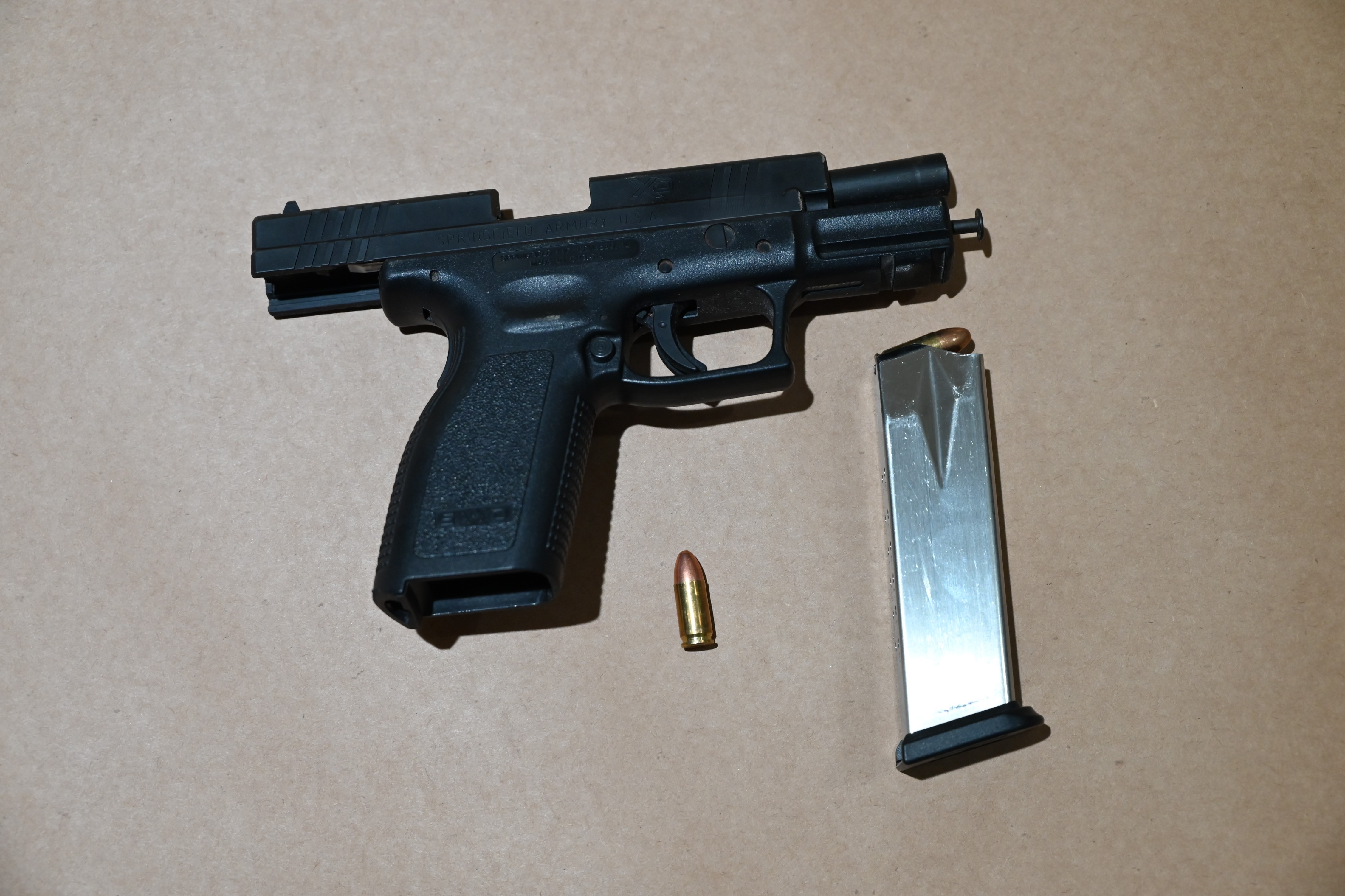 Forged Check Investigation Leads to Search Warrants and Seizure of an Illegal Handgun