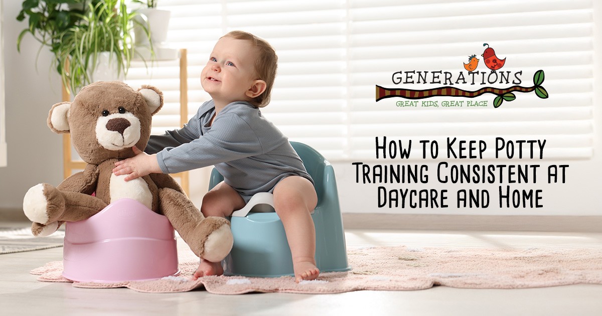 Smiling toddler on a potty chair beside a teddy bear on another potty in a bright room.