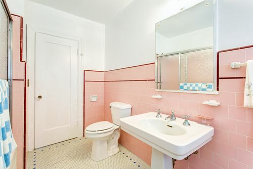 pink bathroom wall tile with red boarder