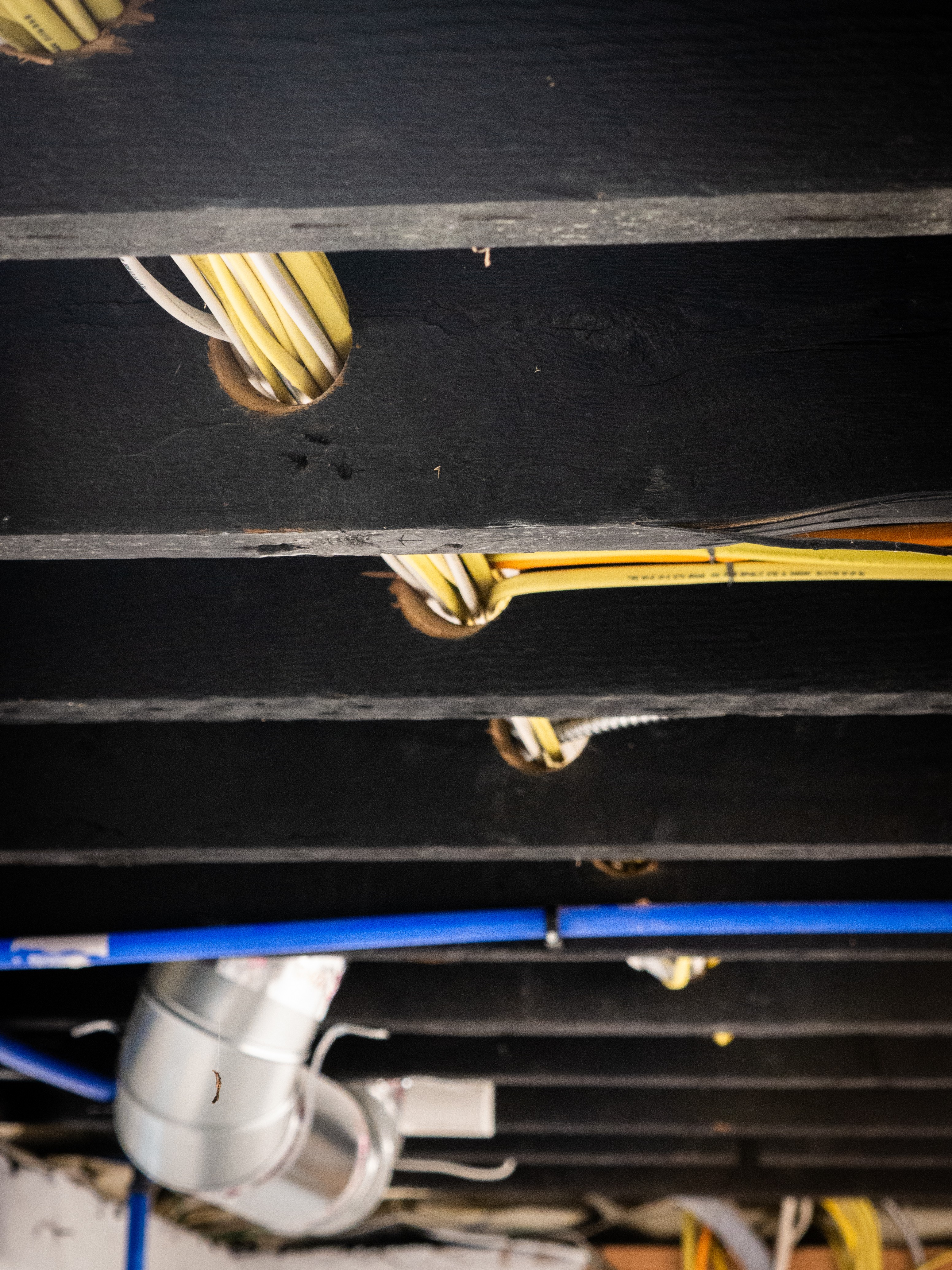 Unlimited Electric professional performing a home electrical upgrade