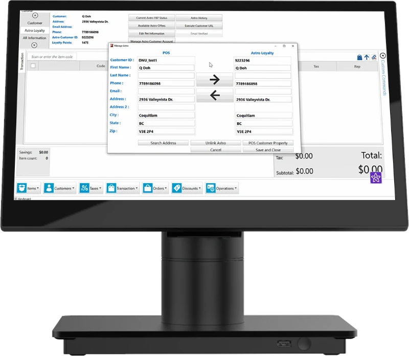A computer monitor displays a point-of-sale system with a pop-up customer data entry form.