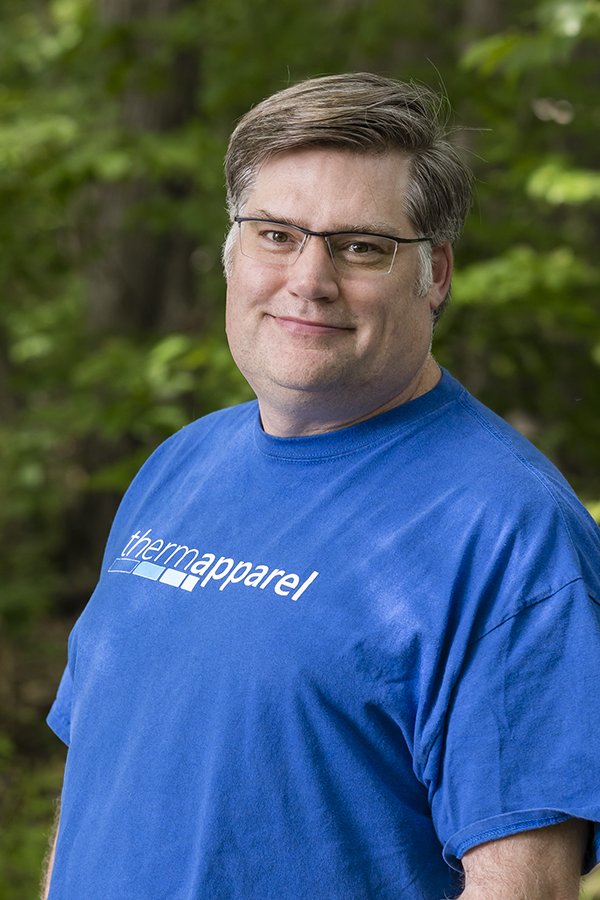 a man wearing a blue shirt