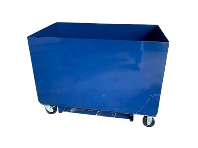 Large blue rectangular metal bin on four caster wheels, isolated on a white background.