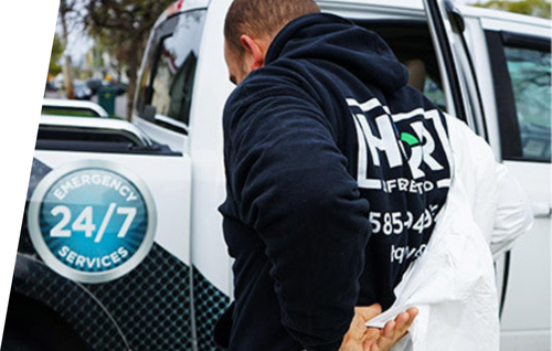 Residential damage restoration team at work