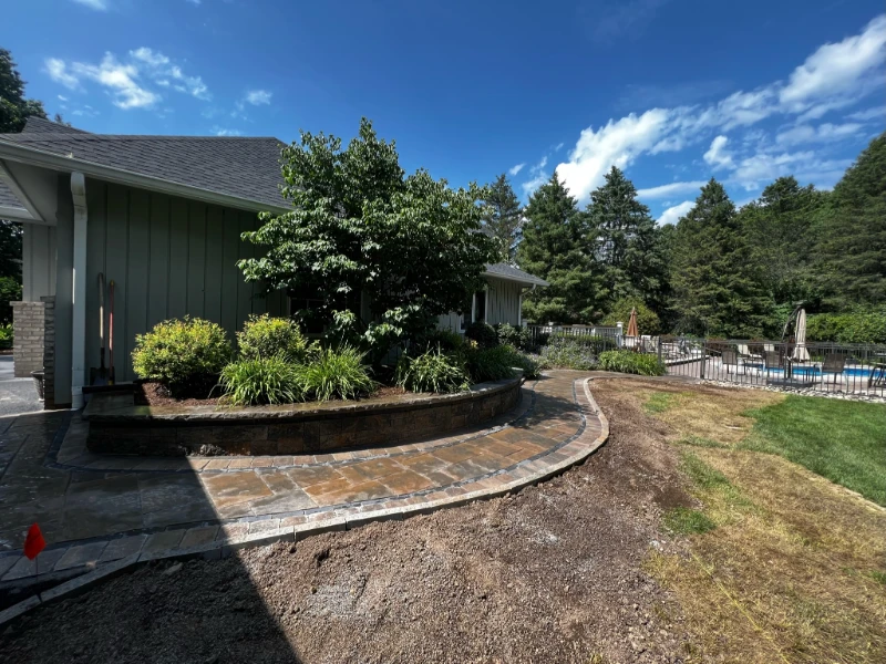 fresh flowers and mulch on home walkway