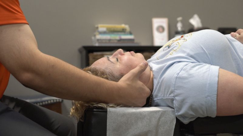 chiropractic working on a patient's neck