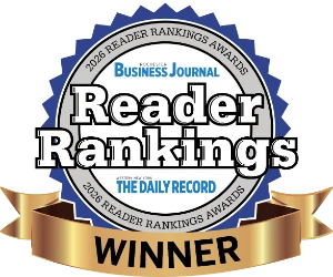 Blue and gold Reader Rankings Winner badge from Business Journal and The Daily Record.
