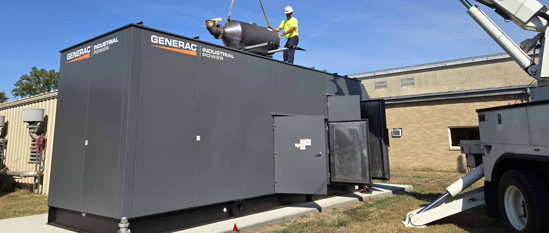 Large Kohler commercial generator outdoors.