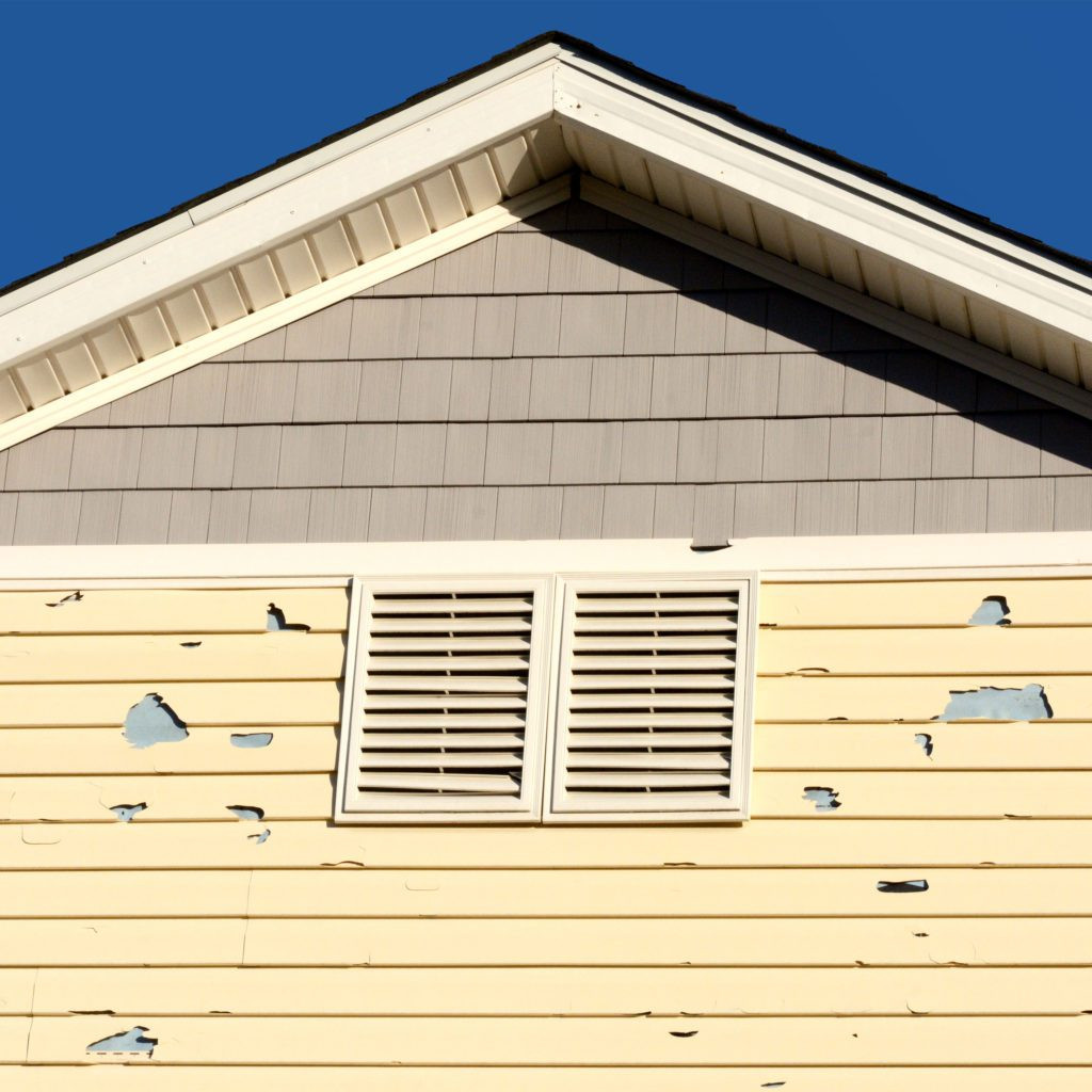 Broken siding on home