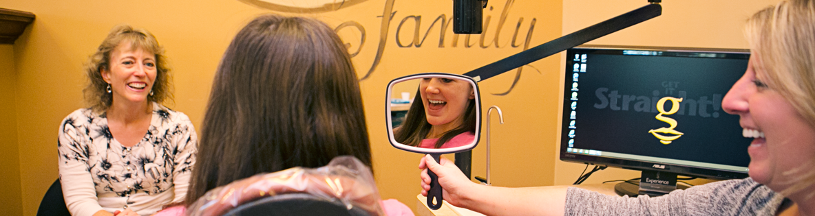 teen after getting their braces removed at canandaigua smiles orthodontic and pediatric dentistry