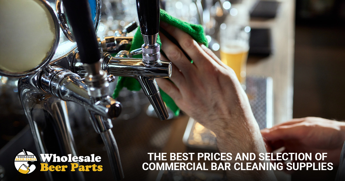 Bartender cleaning beer taps