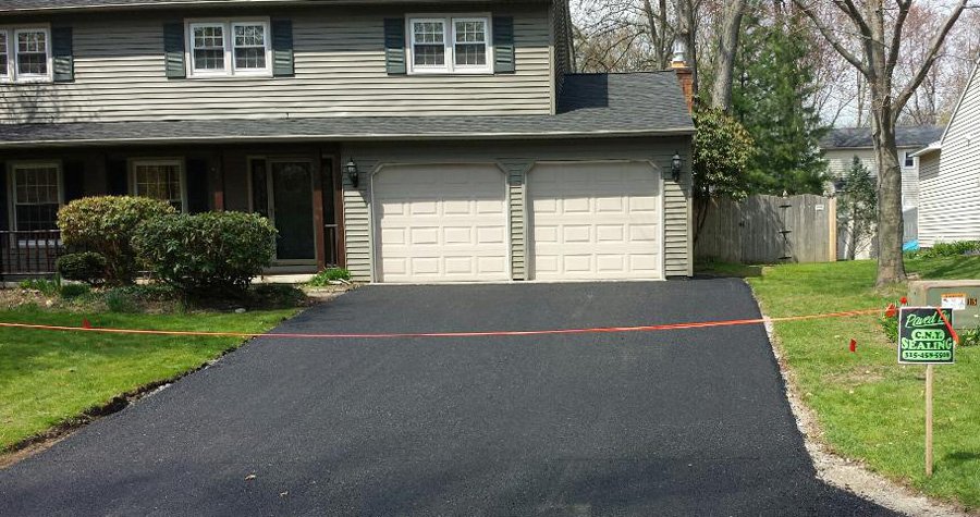 Summer Sealcoating for Improved Winter Driveway Protection