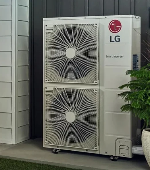 two outdoor LG Smart Inverter AC units placed on a gravel surface