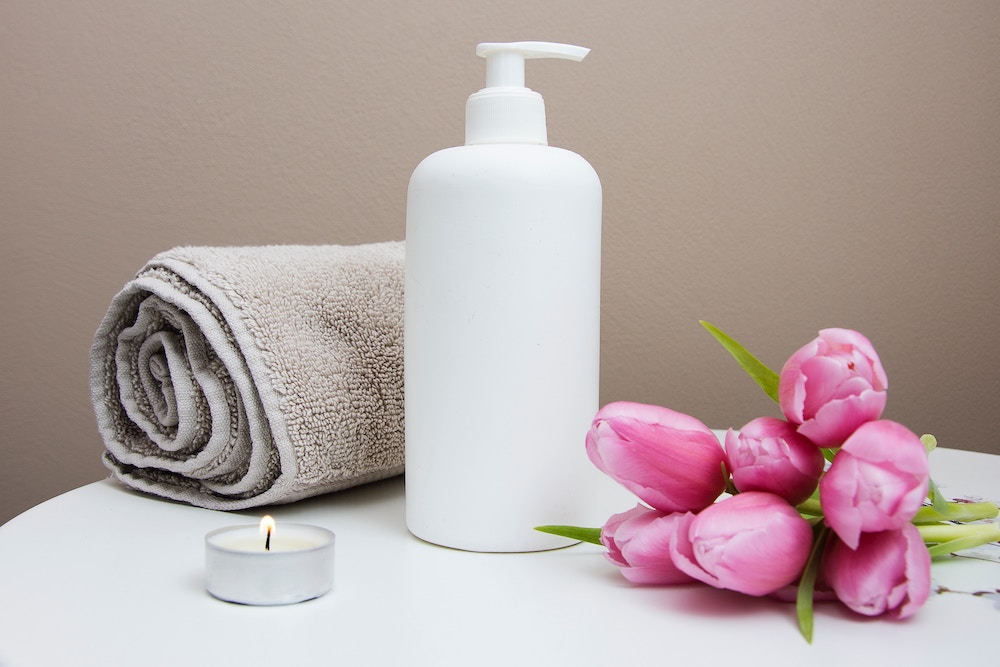 table with relaxing spa items on it