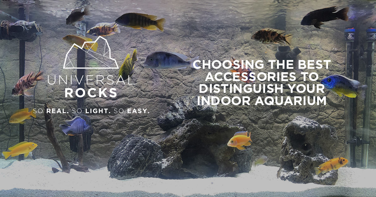 faux rocks and background panel in aquarium tank with tropical fish