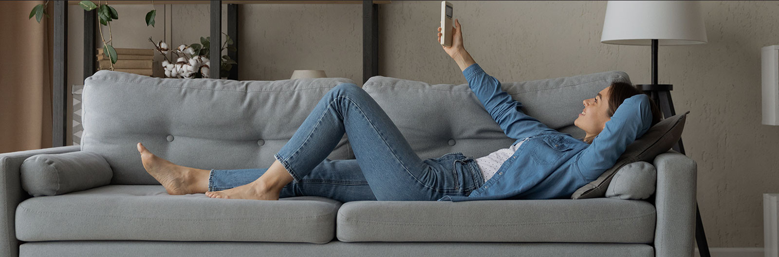 woman laying on couch