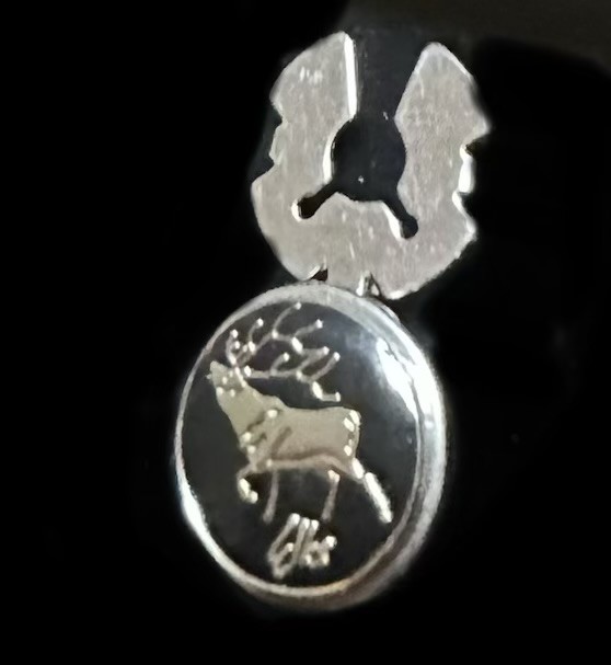 Elk button cover
