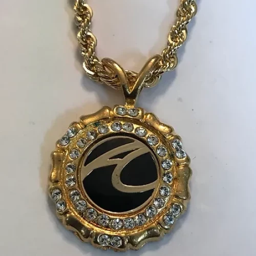 American Coach logo Medallion $59