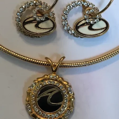 American Coach logo Medallion $59