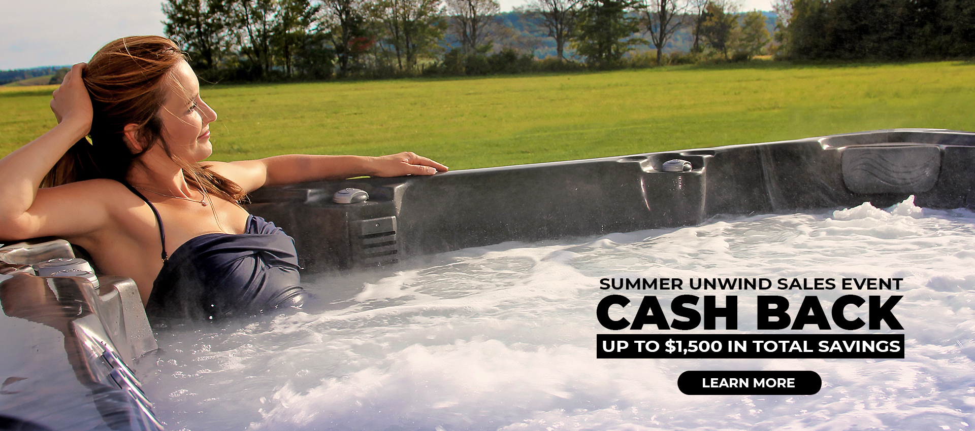 woman relaxing in pdc spas hot tub - July Cash Back Promo save up to $1,500