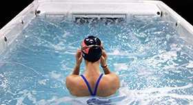 woman getting ready for Swim Spa Workout