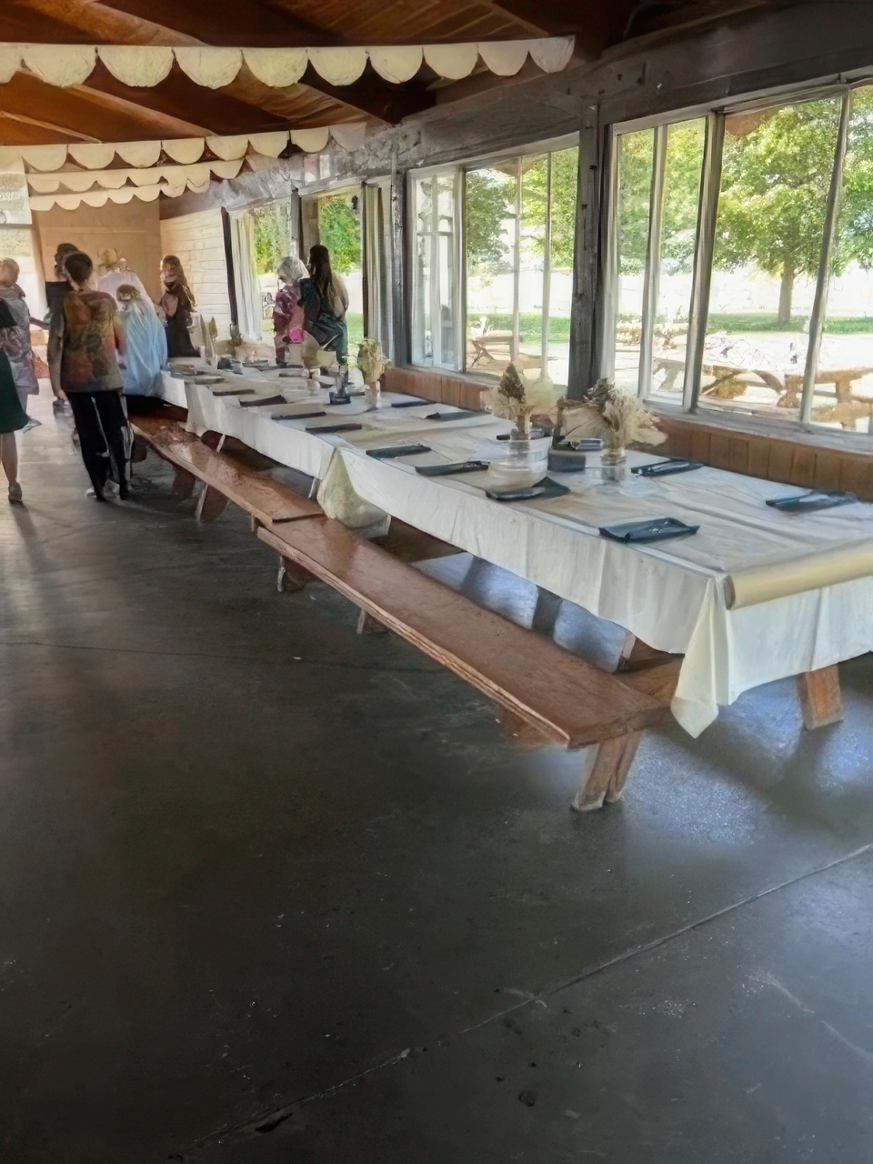 bride and groom walking down outdoor aisle