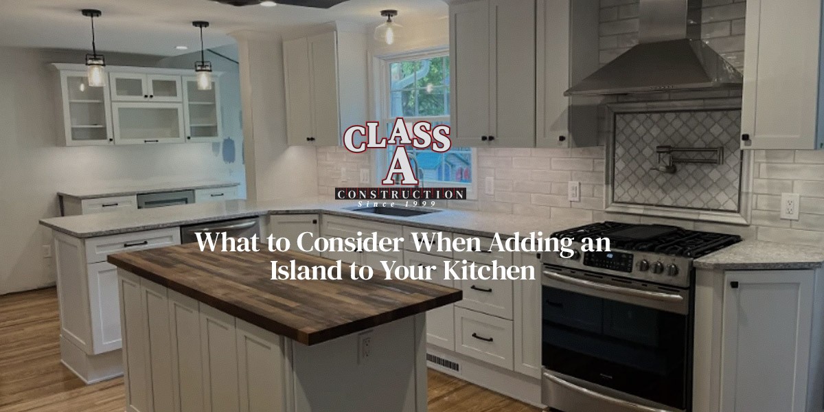Bright kitchen with white cabinets, island, and stainless steel appliances; text overlay about islands.