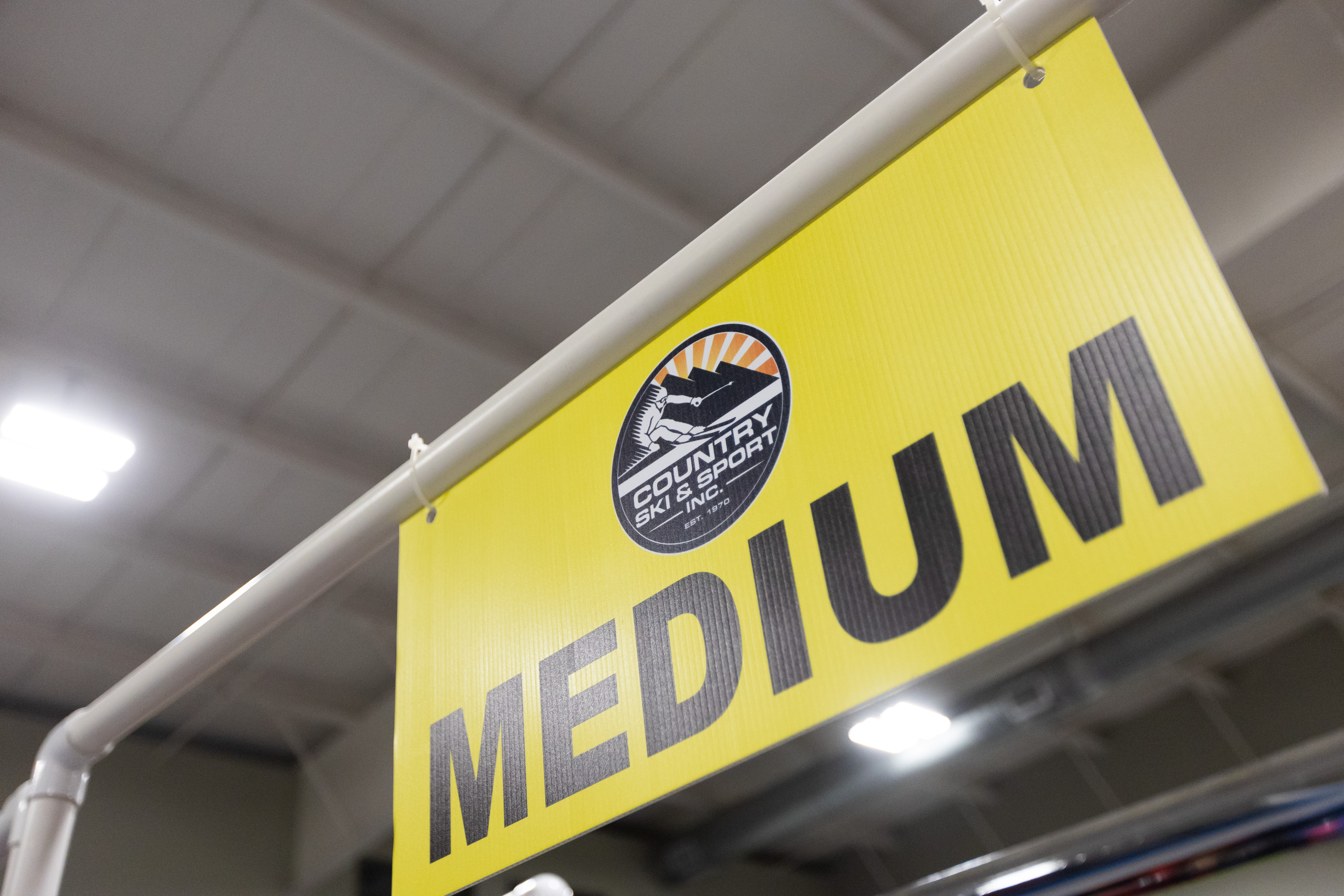 yellow medium sign in store