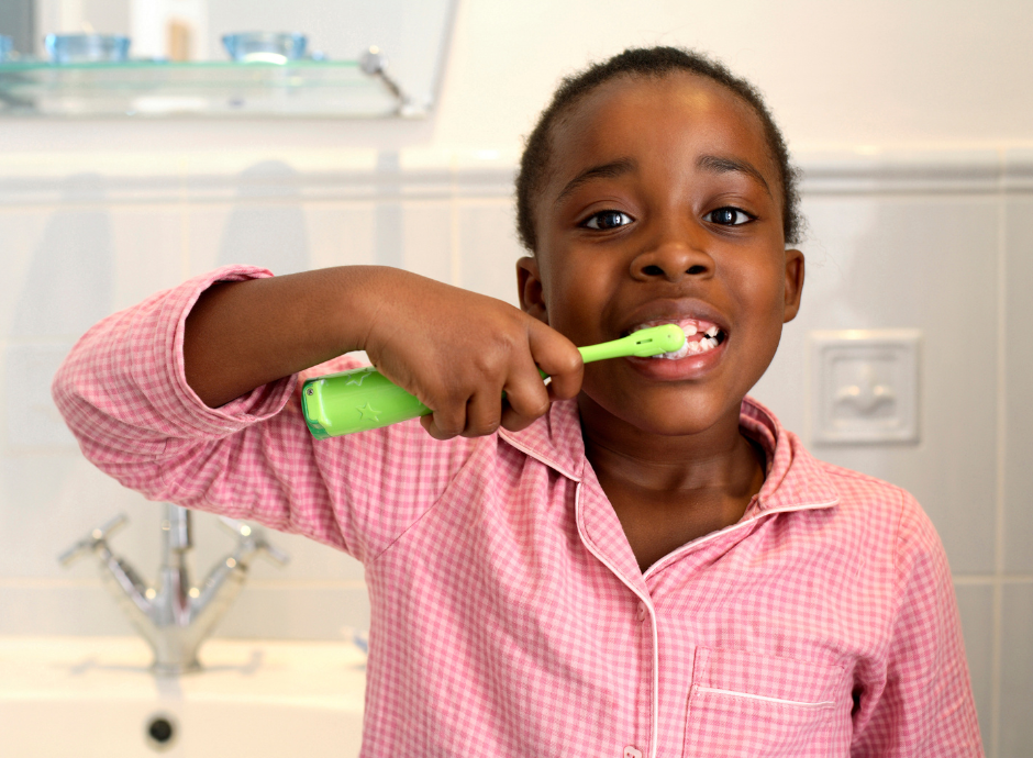 Child brushing teeth