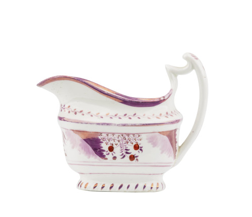 An Antique Lusterware Floral Decorated Gravy Boat