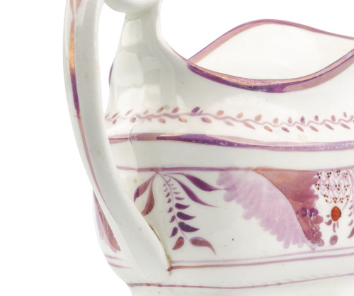 An Antique Lusterware Floral Decorated Gravy Boat