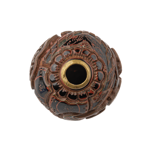 A Meiji Era Japanese Tri-Color Lacquer Carved Ojime Bead