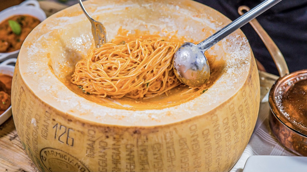 a bowl of soup with a spoon