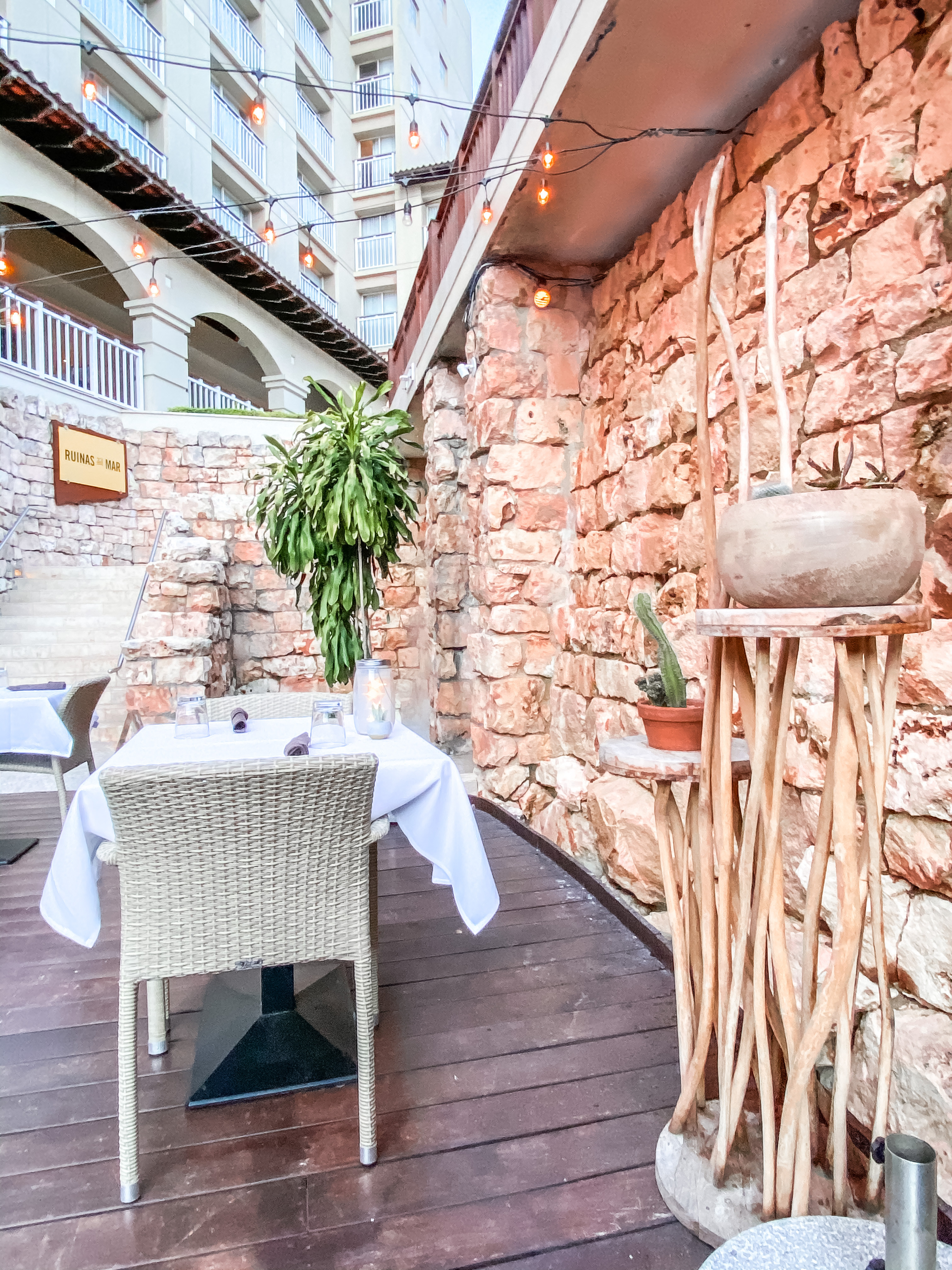 a table and chairs on a deck